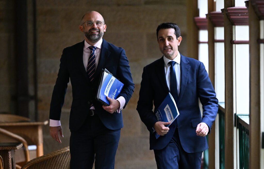 Queensland Premier David Crisafulli (right) and Treasurer David Janetzki arrive to address the media at the state budget media lockup at Parliament House in Brisbane. Mr Janetzki will deliver his first state budget today.