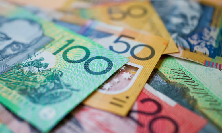 Australian money background showing $100, $50 and $20 notes with a shallow depth of field.