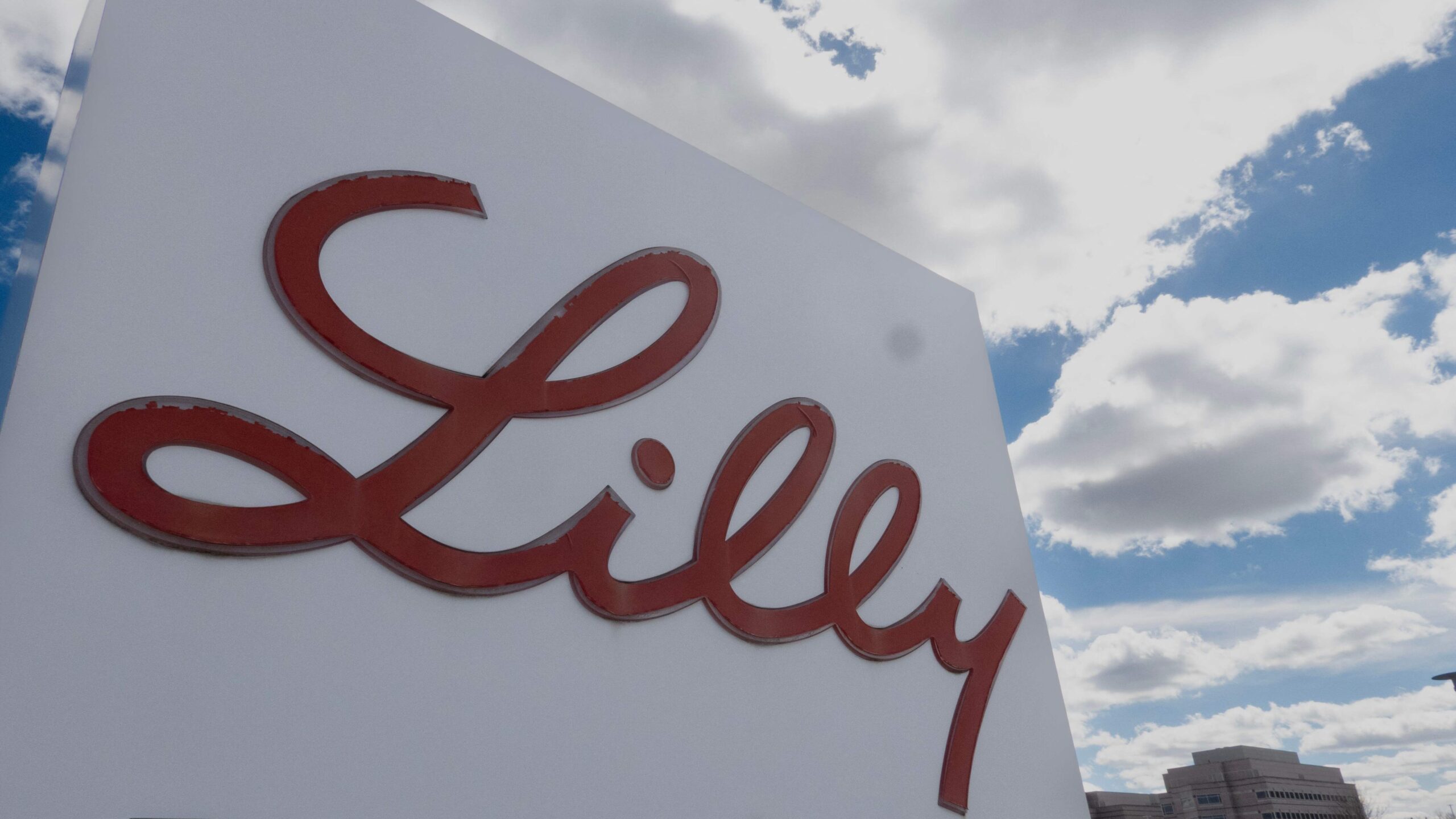 A sign with the company logo sits outside of the headquarters campus of Eli Lilly and Company on March 17, 2024 in Indianapolis, Indiana. Lilly, a pharmaceutical company, employs more than 12.000 people in Indianapolis and more than 42,000 worldwide.   Scott Olson/Getty Images/AFP (Photo by SCOTT OLSON / GETTY IMAGES NORTH AMERICA / Getty Images via AFP)