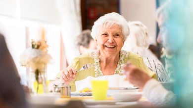 Portrait photo of a senior woman having lunch