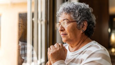 Senior woman contemplating at home