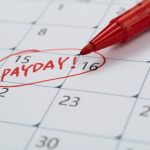 Calendar with red marked payday